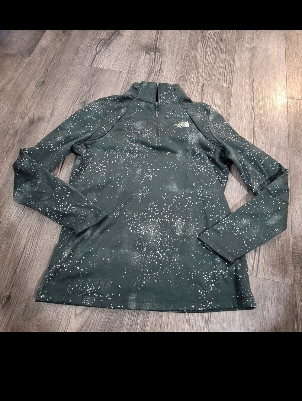 The North Face quarter-zip pullover in a green "galaxy"